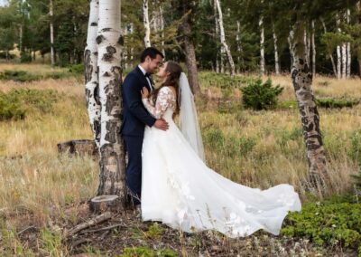Wedding videographer and photographer Jeremiah captures bride and groom among the aspen trees in Colorado Springs