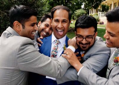Indian wedding photography videography combo package groom having fun with his groomsmen